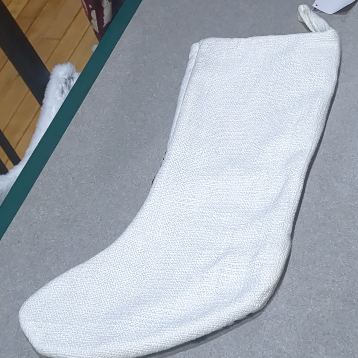 Stocking white with black stripes.