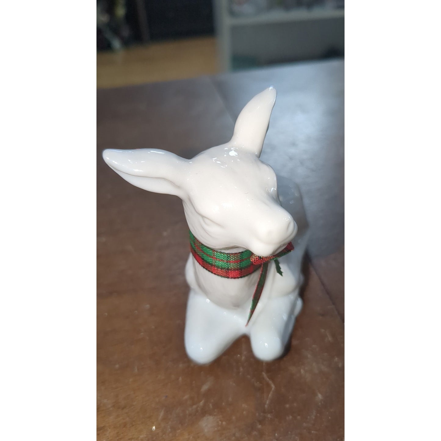 white porcelain reindeer with plaid bow