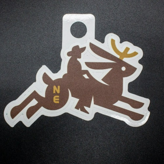 Ride Em Cowboy on a Nebraska Jackalope Weather Resistant Sticker | HEARTlandia