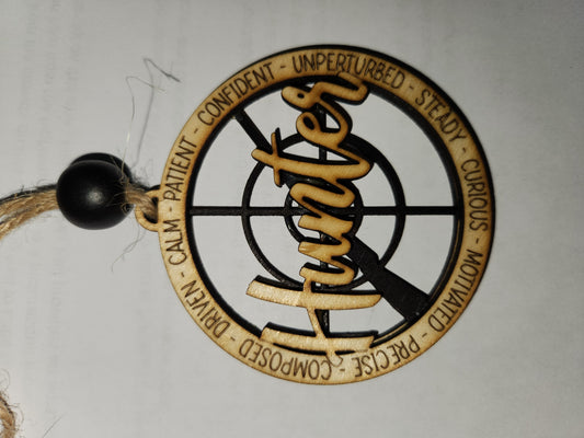 Wooden ornament or car charm. Hunter