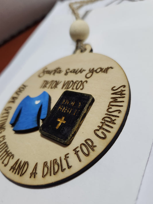 Ornament or car charm. Santa saw your tiktok videos