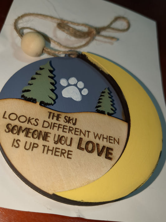 Ornament the sky looks different when someone you love is up there with pet paw. Memorial for loss of loved pet