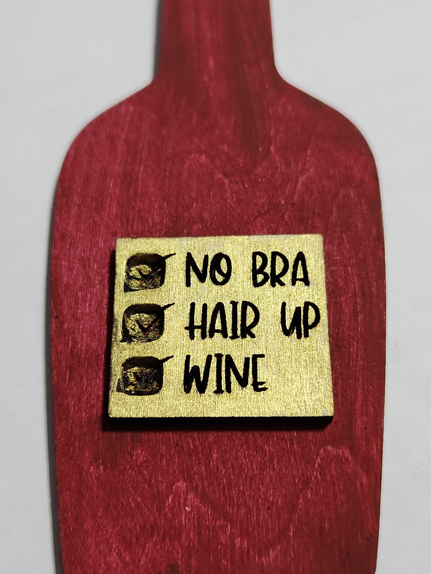 Wine tag. Check No Bra. Check Hair up. Check Wine. Wine bottle