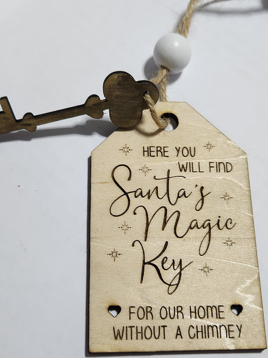 Ornament or car charm. Santa's magic key for our home without a chimney. Silver or gold colored key