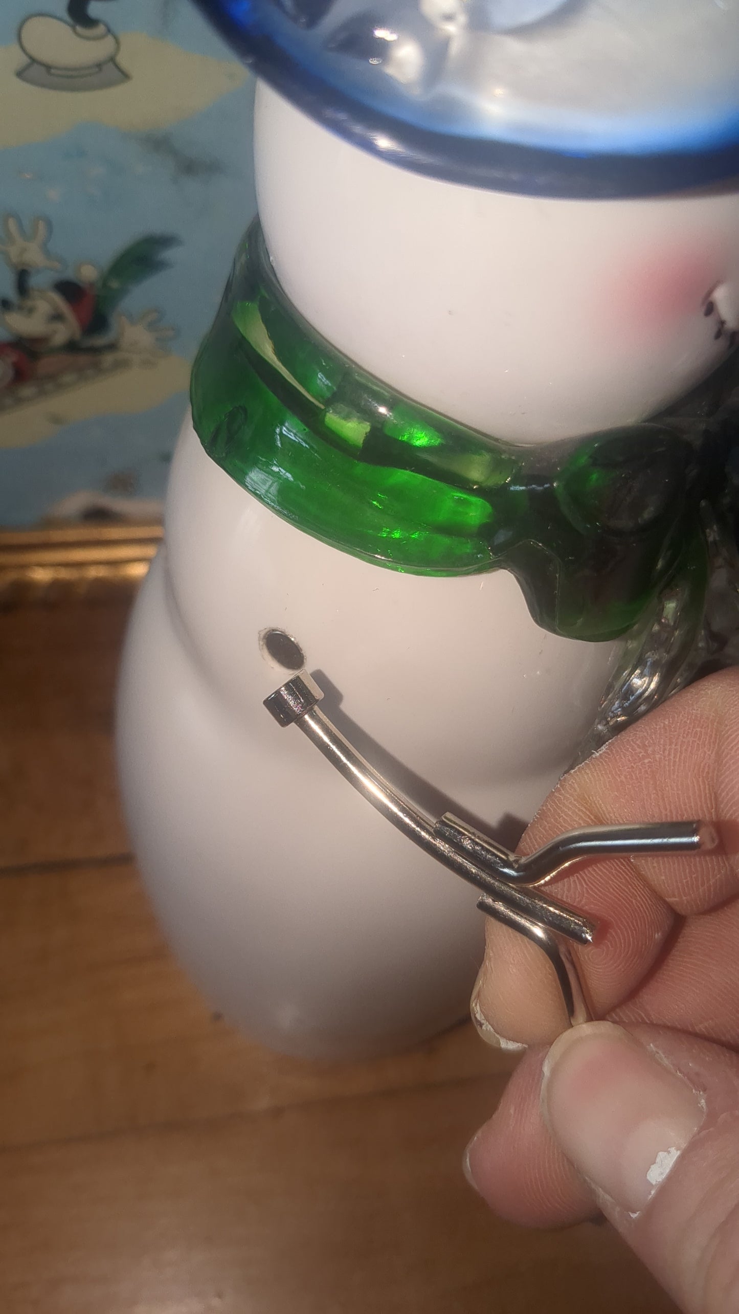 Acrylic snowman with detachable arms for easy storage