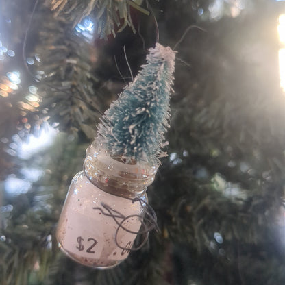 Glass jar With Tree Ornament. Jar is 1 inch tall