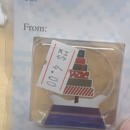 Pocket charm snow globe appearance with tree inside. friends are the true gifts of Christmas.