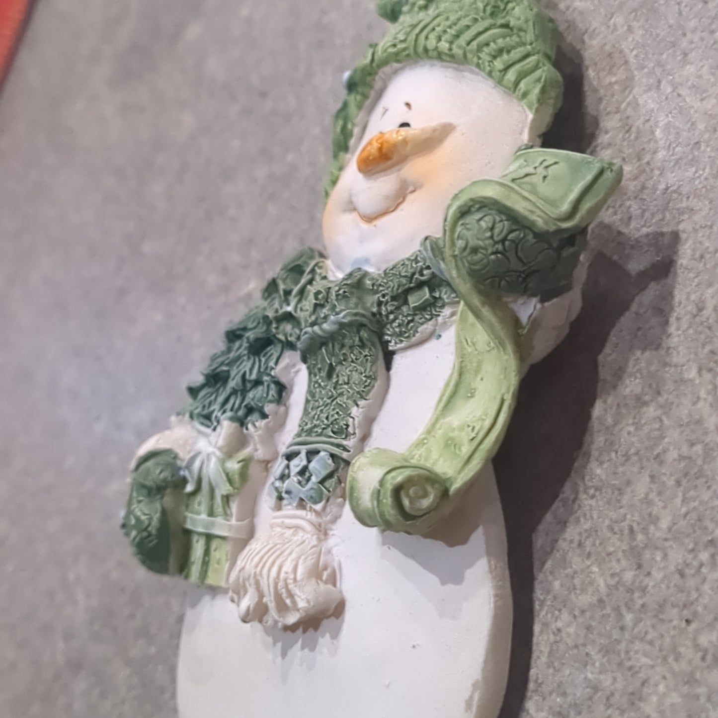 Polyacrylic snowman ornament with a scroll and gift - green CLEARANCE og1
