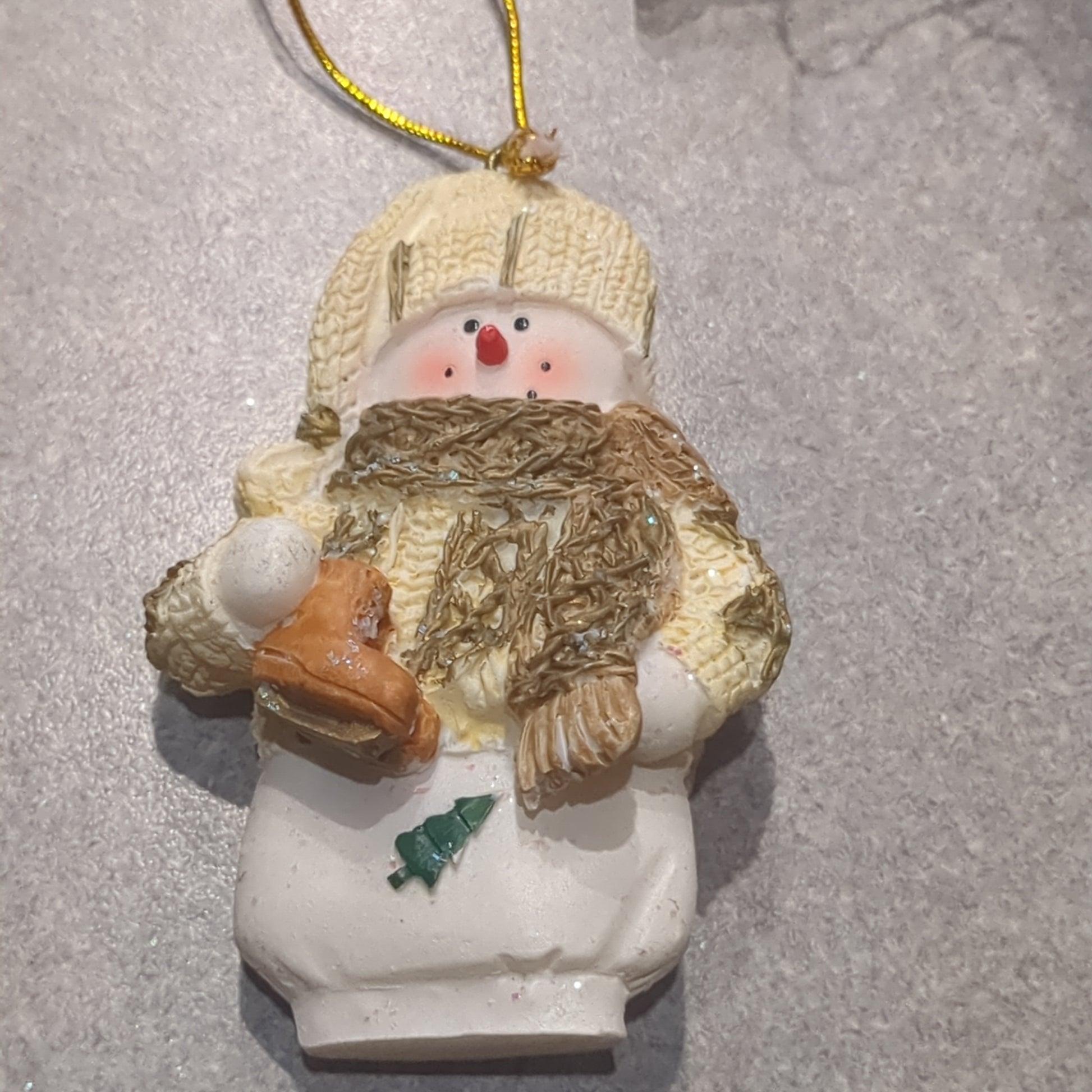 Polyacrylic snowman ornament with an ice skate yellow CLEARANCE OY5