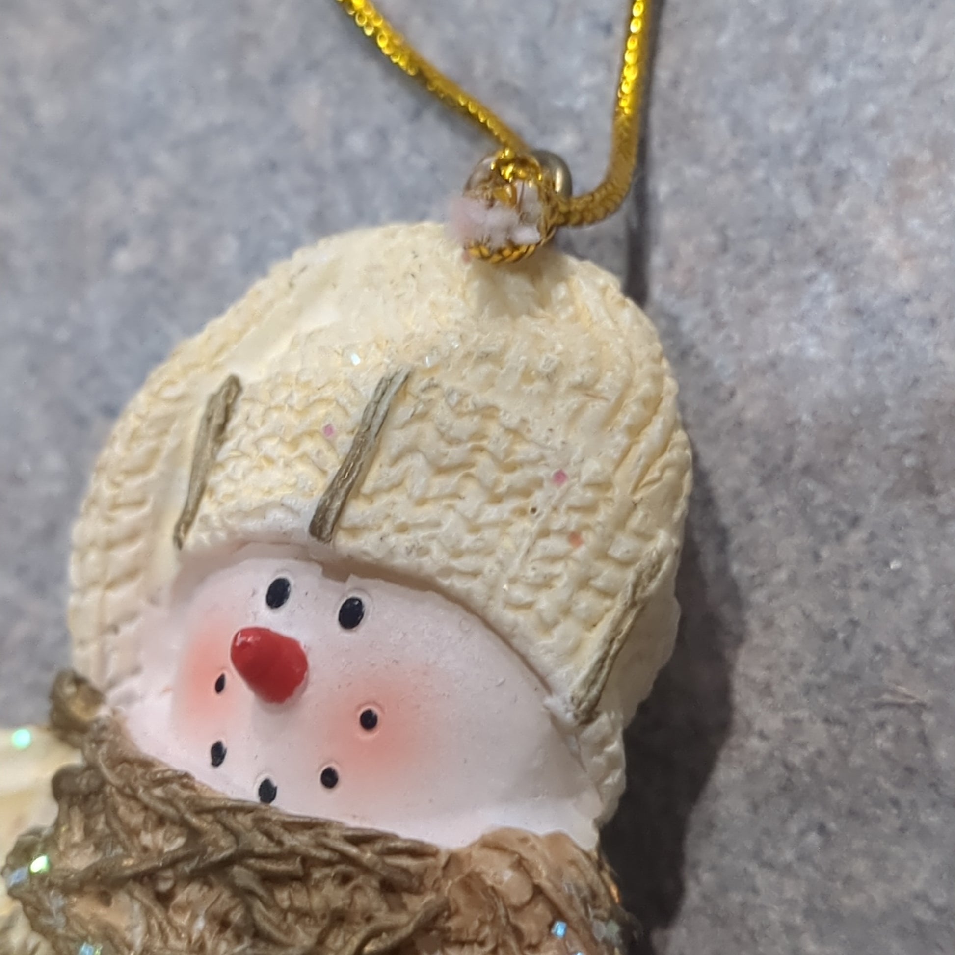 Polyacrylic snowman ornament with an ice skate yellow CLEARANCE OY5