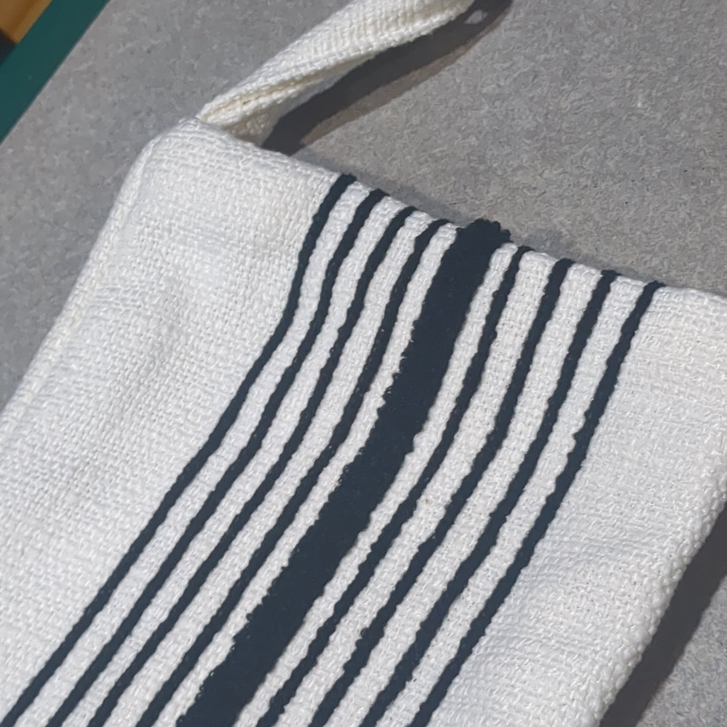 Stocking white with black stripes.