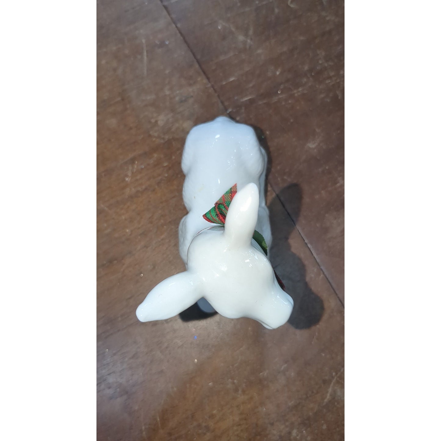 white porcelain reindeer with plaid bow