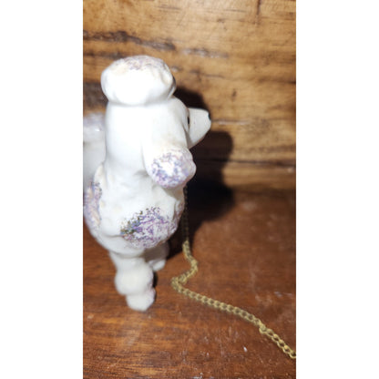 Vintage Poodles Joined by Chain
