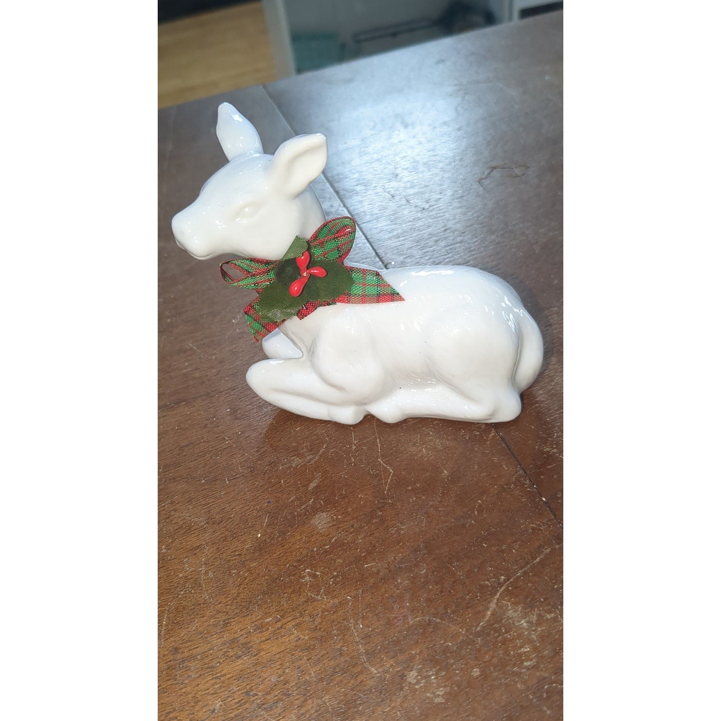 white porcelain reindeer with plaid bow
