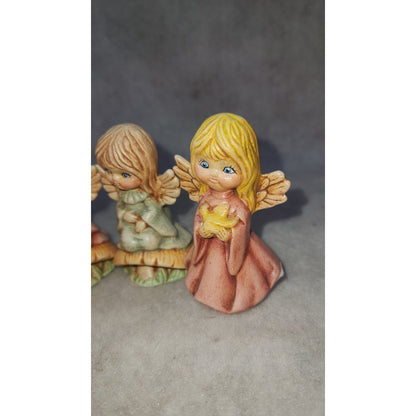 Vintage angels on mushrooms and with a bird handpainted