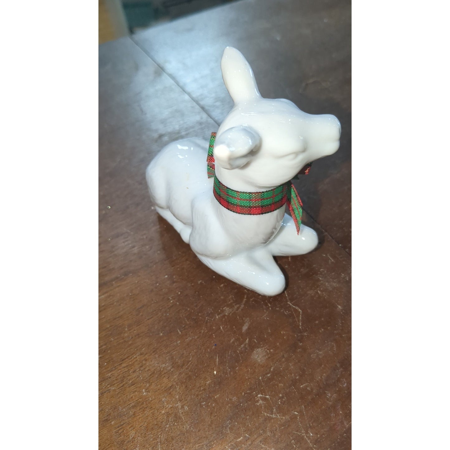 white porcelain reindeer with plaid bow