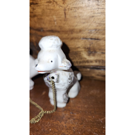 Vintage Poodles Joined by Chain