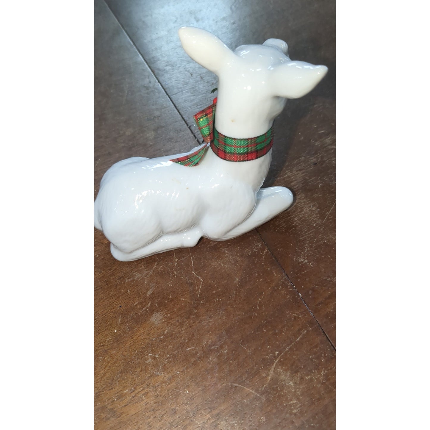 white porcelain reindeer with plaid bow