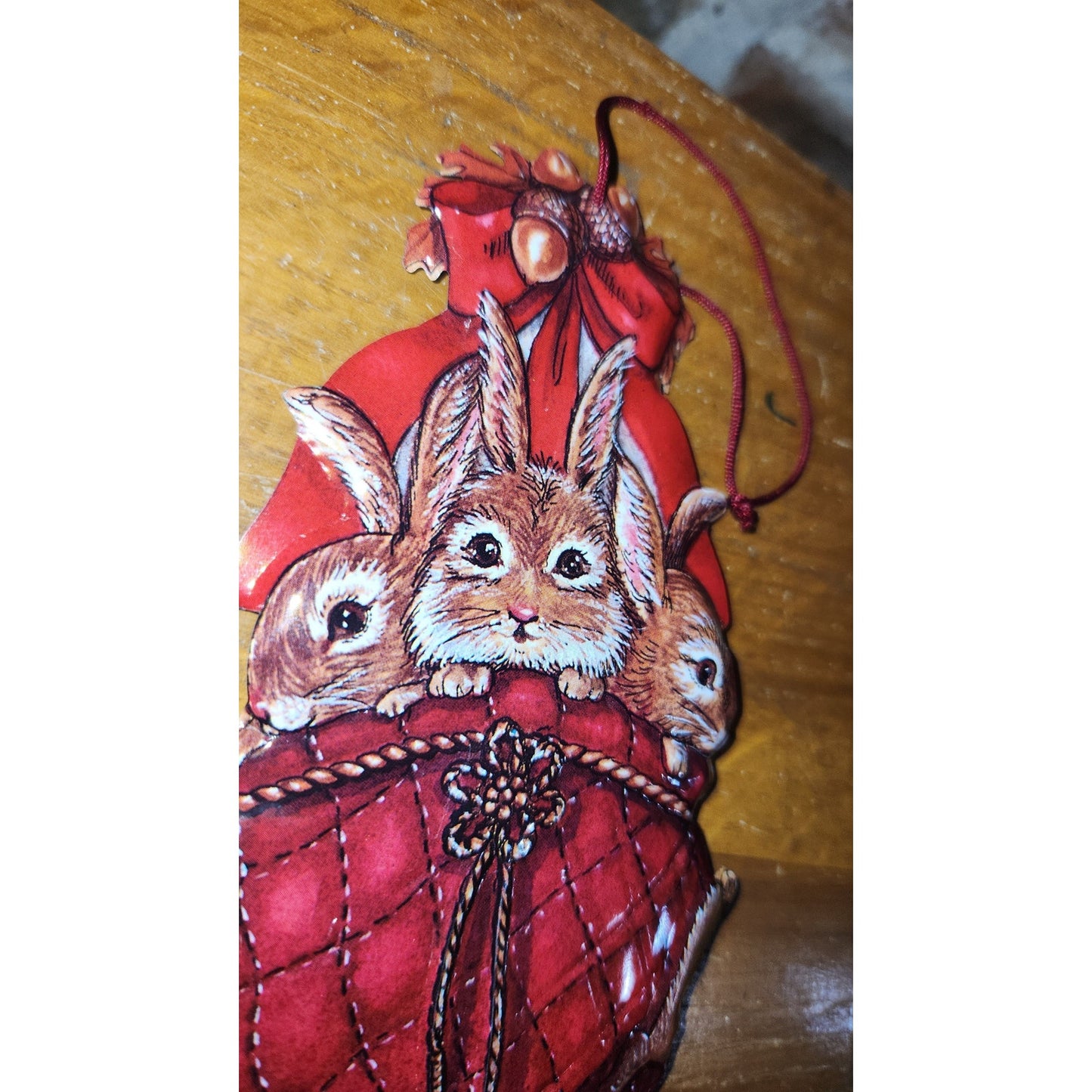 THREE BUNNIES IN A BASKET 5.25” PRESS TIN ORNAMENT (CB4525)