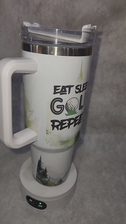 40 Oz Insulated Stainless Steel. Travel Tumbler says, "Eat Sleep Golf Repeat" tgo4
