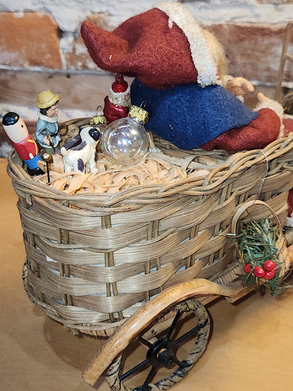 Vintage Bethany Lowe Santa Claus Wearing Wool in a Woven Sleigh With Toys AS IS s90