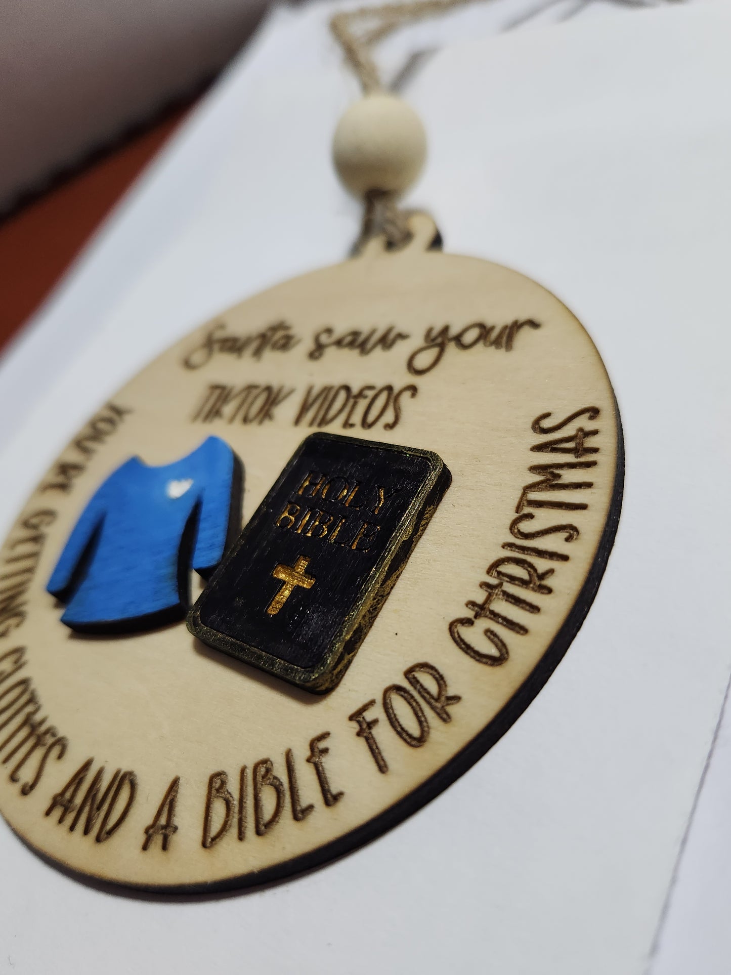 Ornament or car charm. Santa saw your tiktok videos