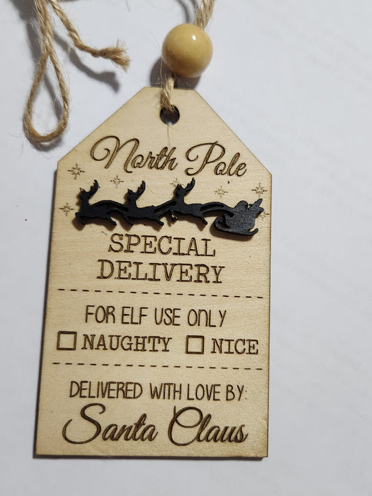 Wooden ornament or car charm.  North Pole special delivery.  Elf use.