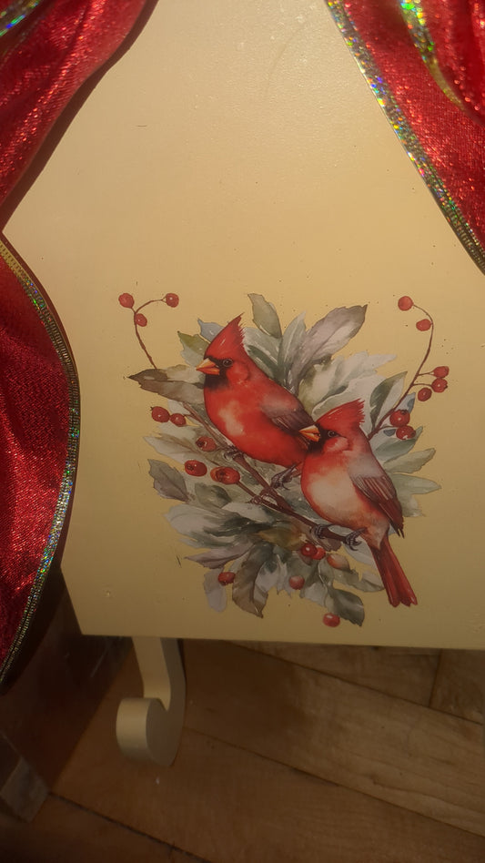 Yellow sled with Cardinals