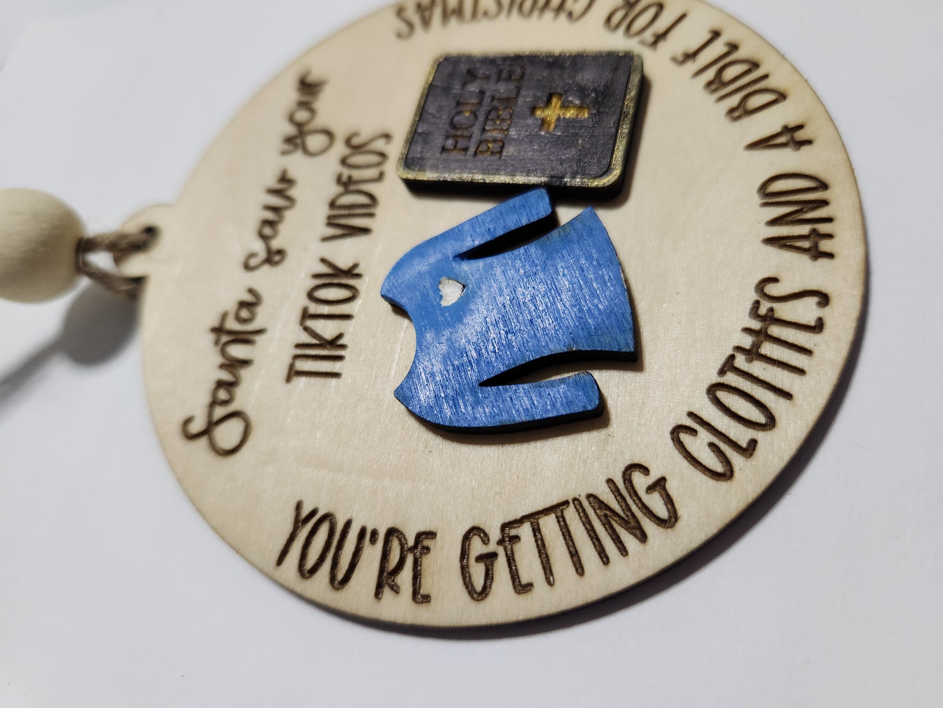 Ornament or car charm. Santa saw your tiktok videos