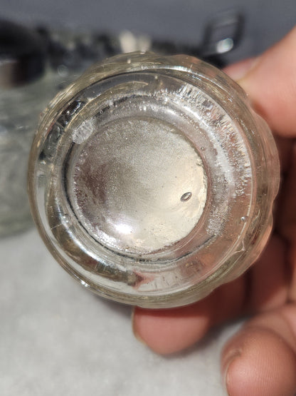 Vintage clear cut glass salt, pepper and condiment set in aluminum holder has tiny spoon sps24