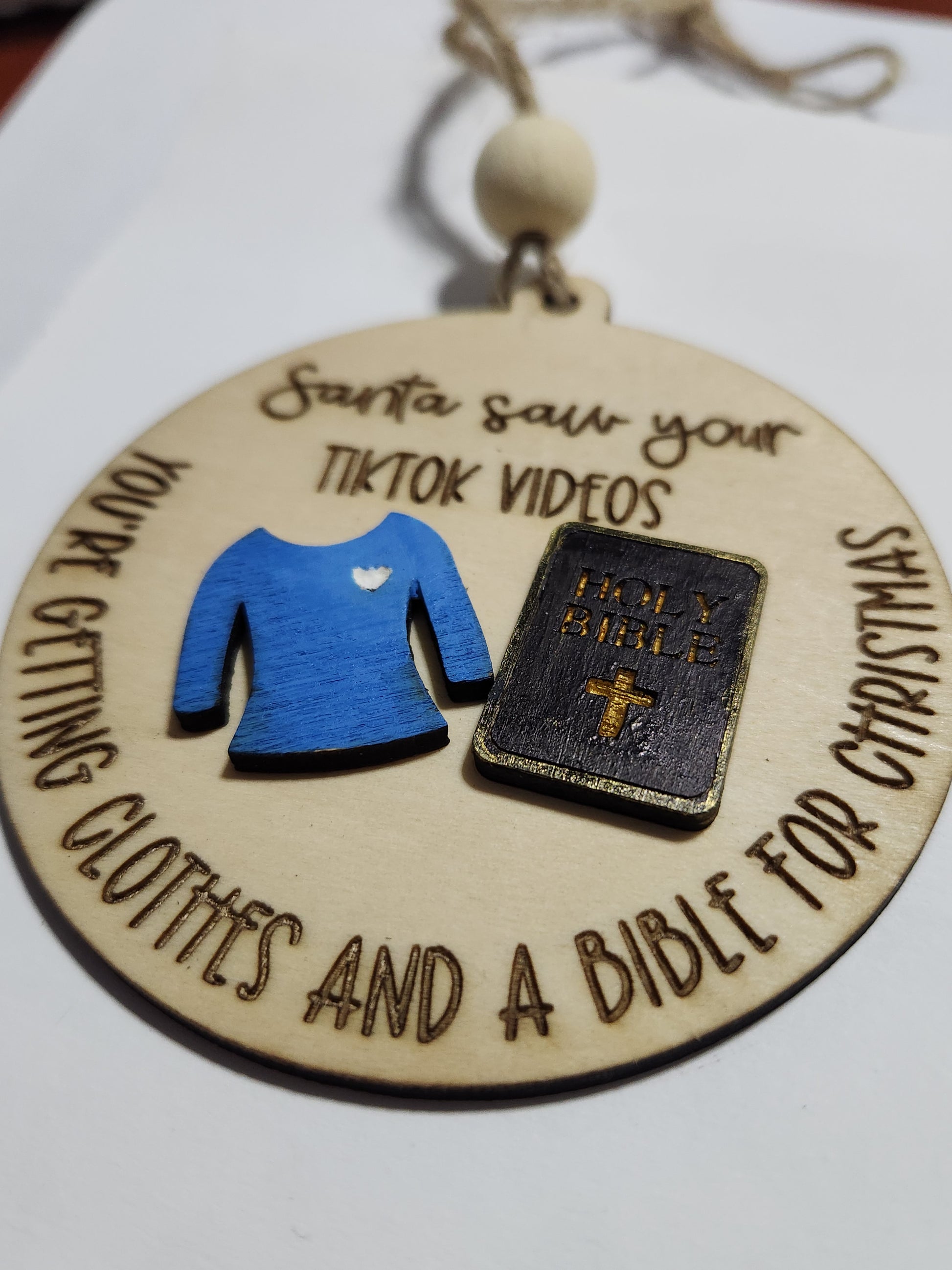 Ornament or car charm. Santa saw your tiktok videos