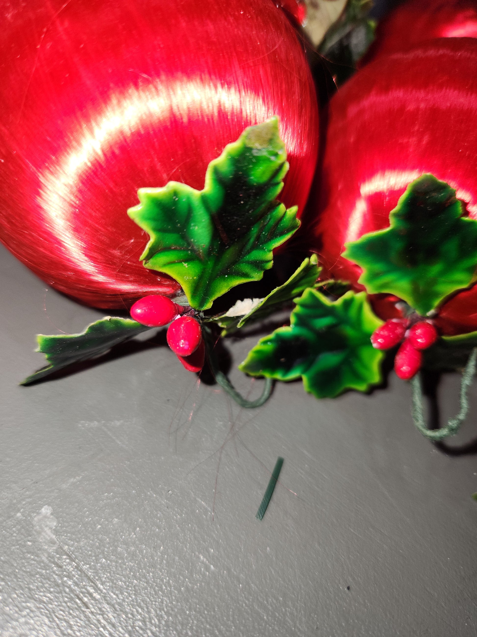 Vintage Red Satin Spun Silk Christmas Ornament 2" Ball With Green Holly Leaf and Green Metal Hanger