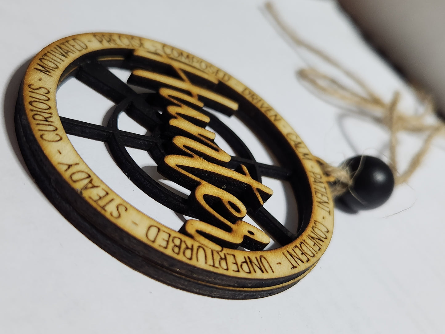 Wooden ornament or car charm.  Hunter