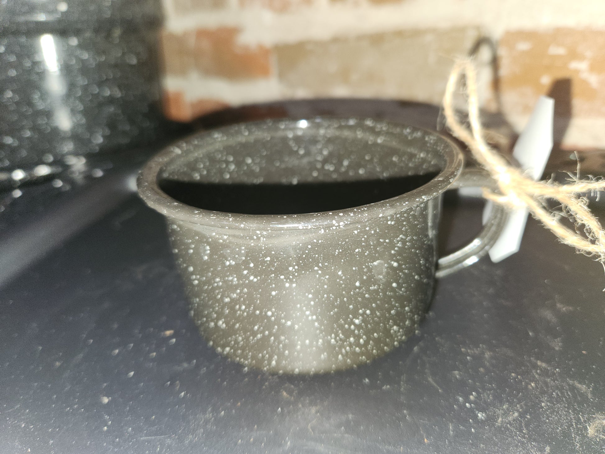 Vintage or vintage looking Black Enameled Cup with White speckles enm3