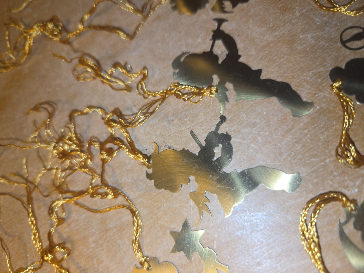 Vintage Probable Brass Angels on Gold String Set of 11