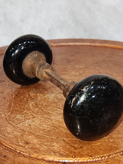 Vintage Antique Porcelain Black Door Knobs attached to a stem kn16