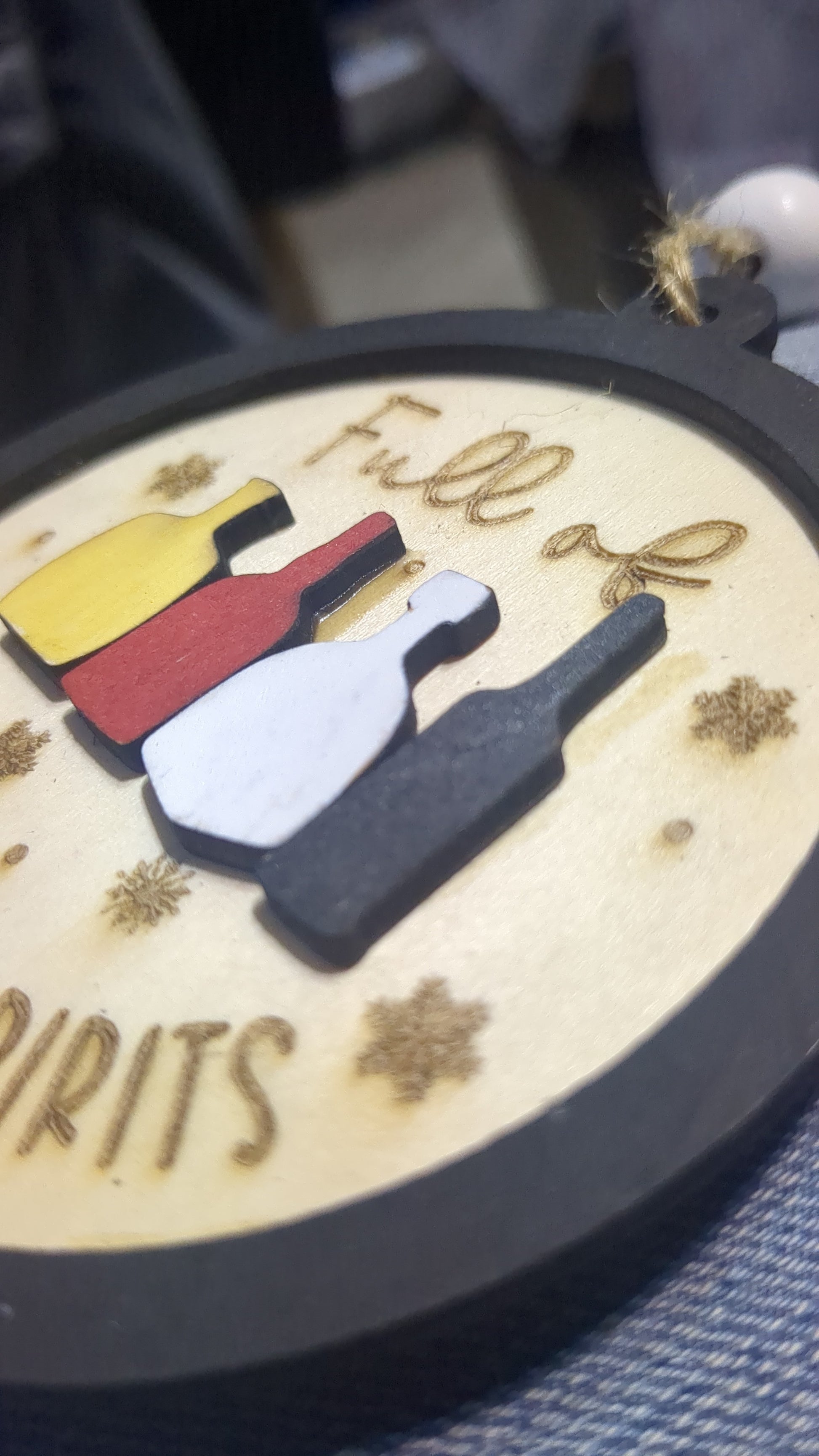 Wooden ornament or car charm. Full of holiday spirits.