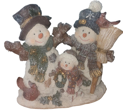 Snowman of three family with Cardinals