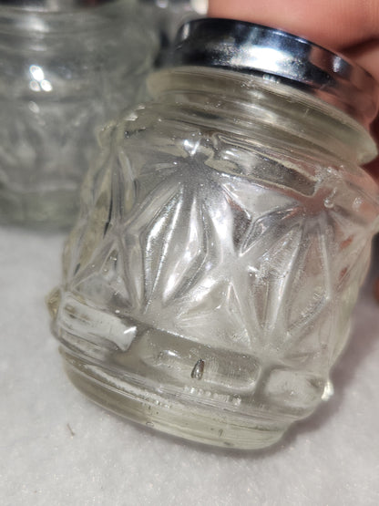 Vintage clear cut glass salt, pepper and condiment set in aluminum holder has tiny spoon sps24