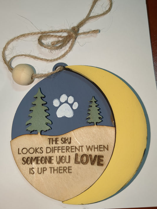 Ornament the sky looks different when someone you love is up there with pet paw.  Memorial for loss of loved pet
