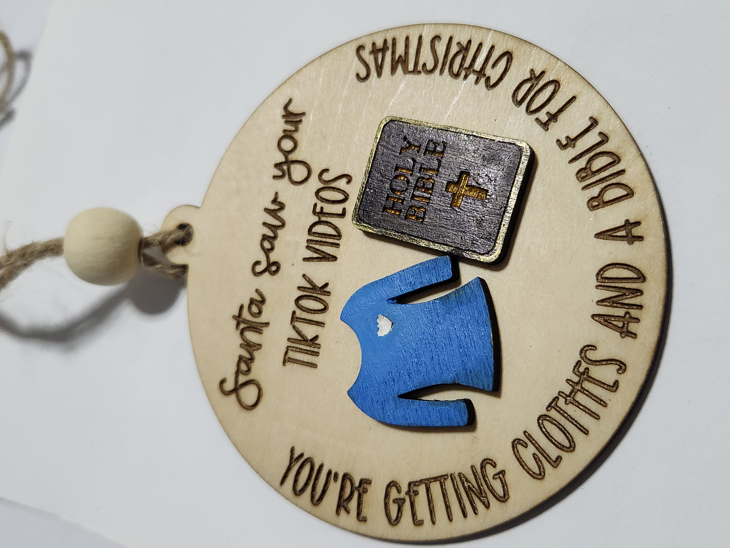 Ornament or car charm. Santa saw your tiktok videos