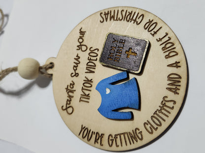 Ornament or car charm. Santa saw your tiktok videos