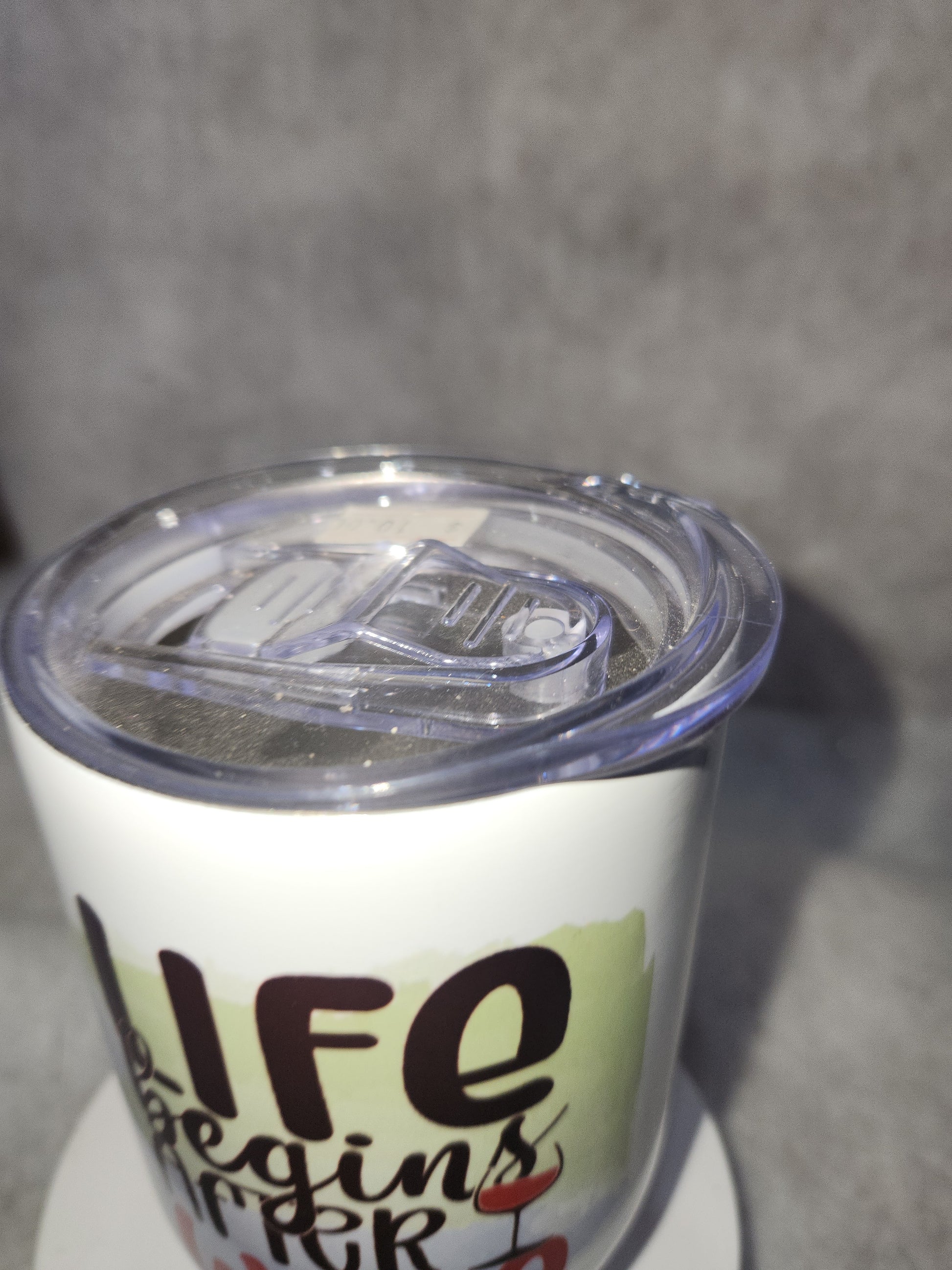 12 Oz stainless steel wine tumbler. It says life begins after wine wt3