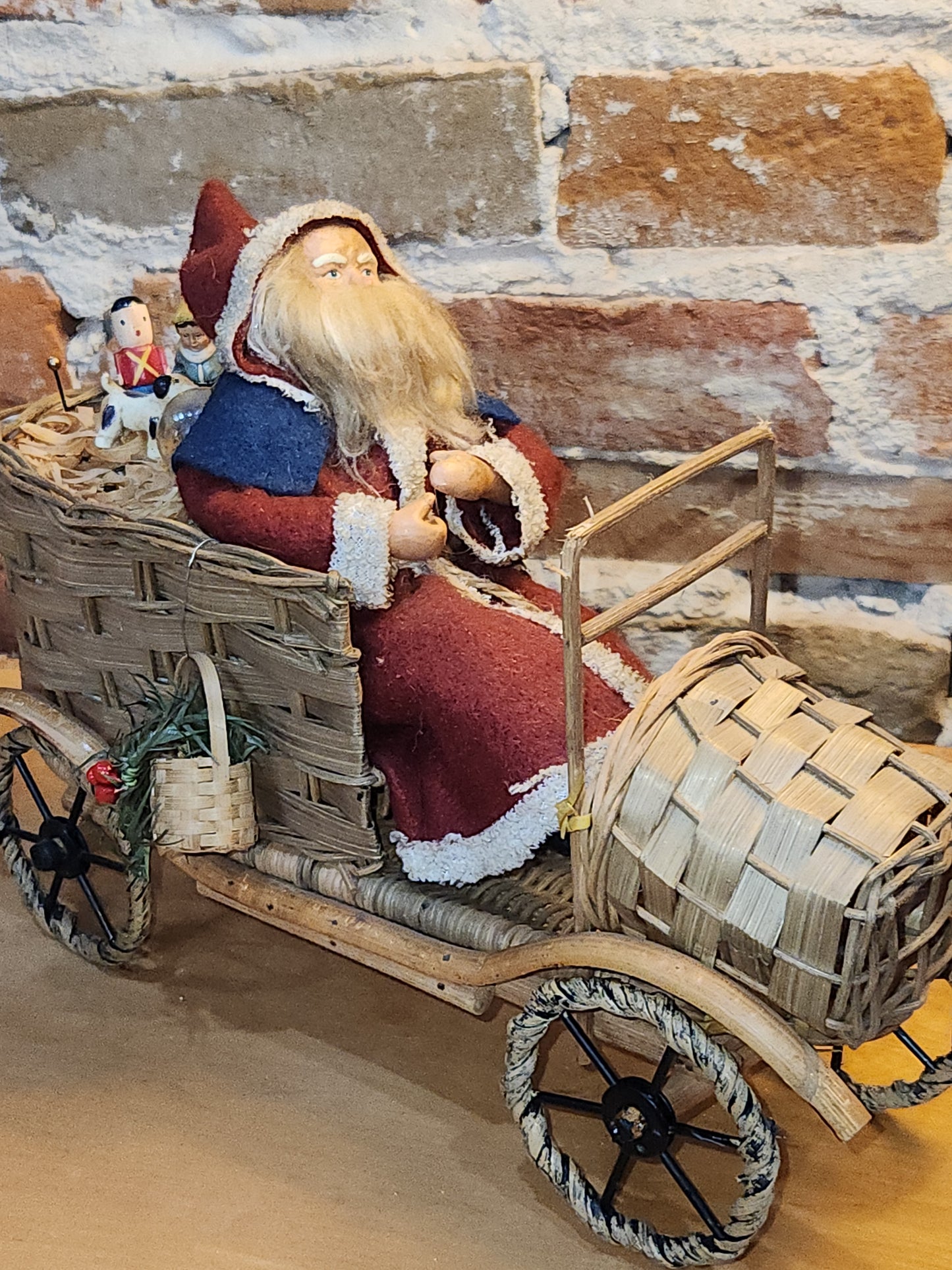 Vintage Bethany Lowe Santa Claus Wearing Wool in a Woven Sleigh With Toys AS IS s90