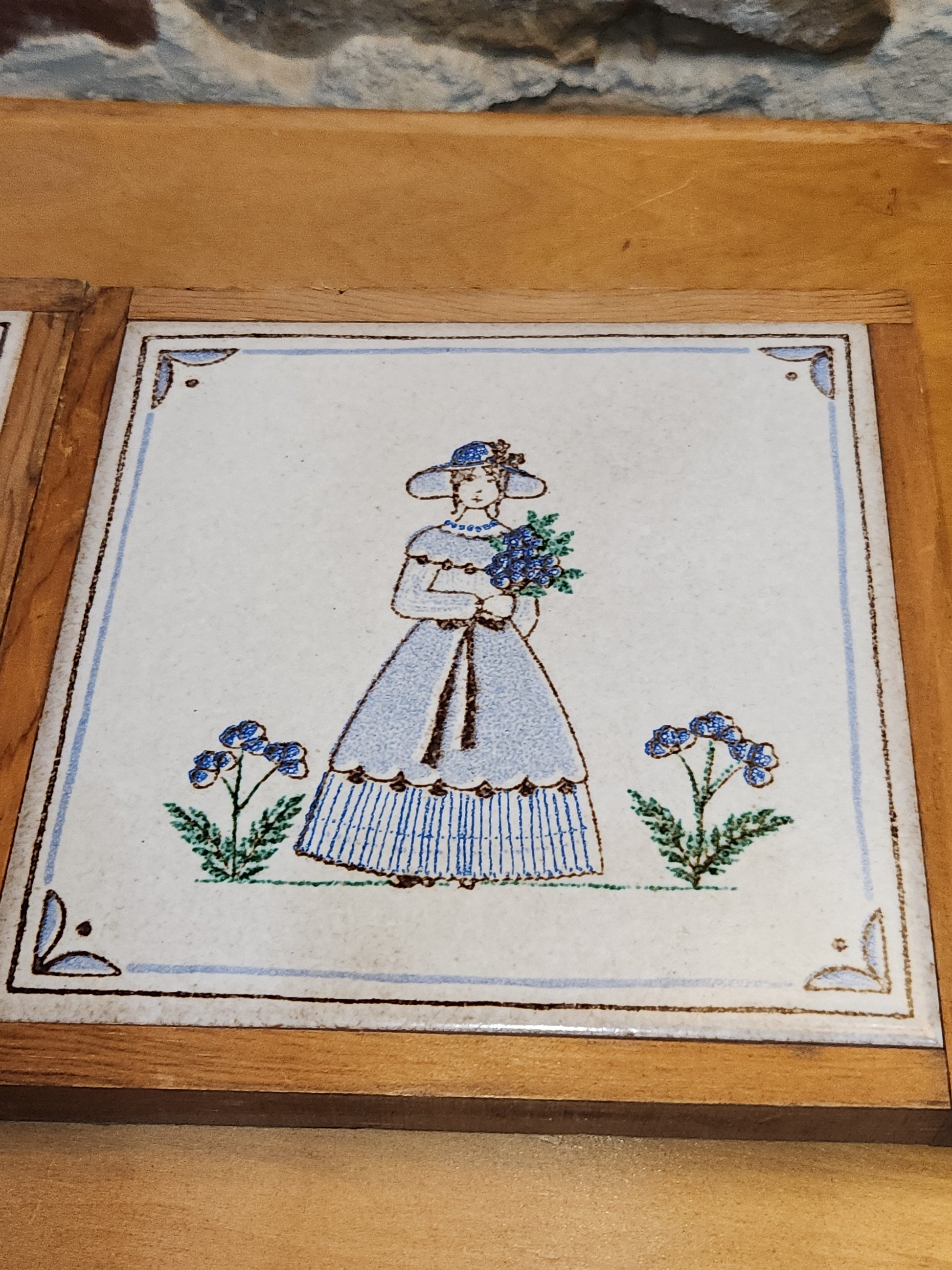 Vintage Pair of Pimme Italian Made Tiles in Frames making Trivets. Drawing is engraved into tile and painted. Man with Falcon and Flower Maiden