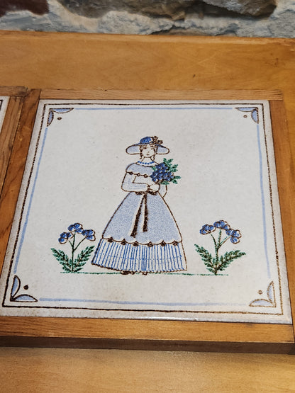 Vintage Pair of Pimme Italian Made Tiles in Frames making Trivets. Drawing is engraved into tile and painted. Man with Falcon and Flower Maiden