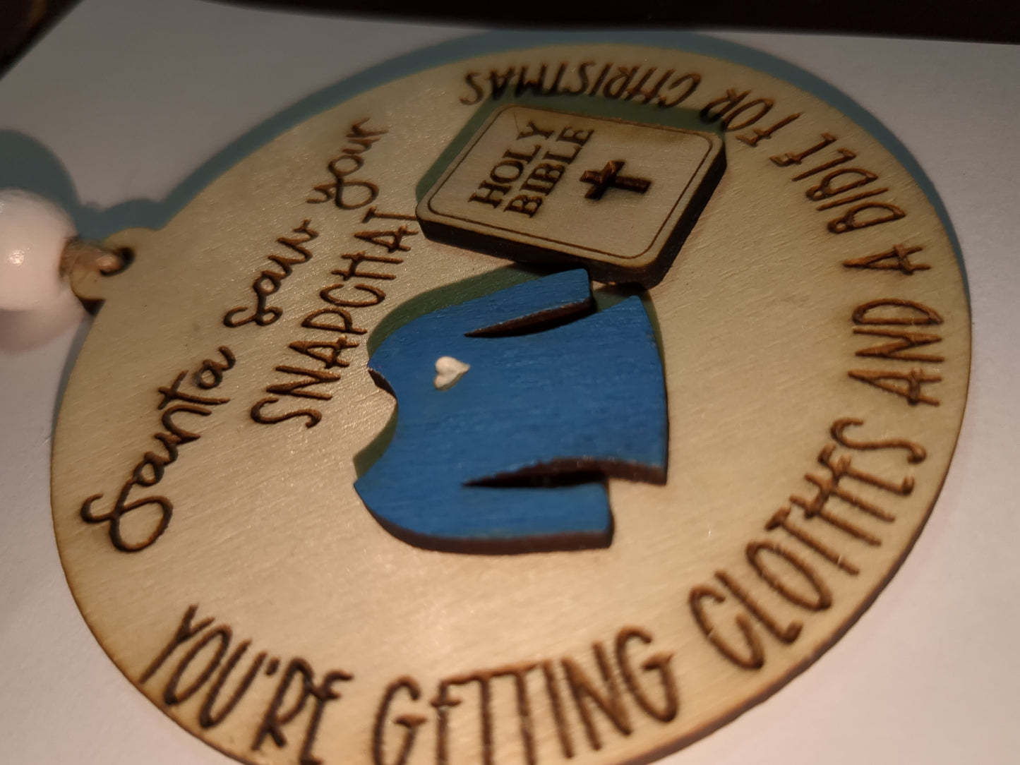 Ornament or car charm. Santa saw your Snapchat