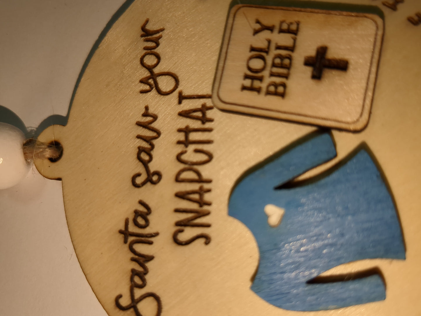 Ornament or car charm. Santa saw your Snapchat