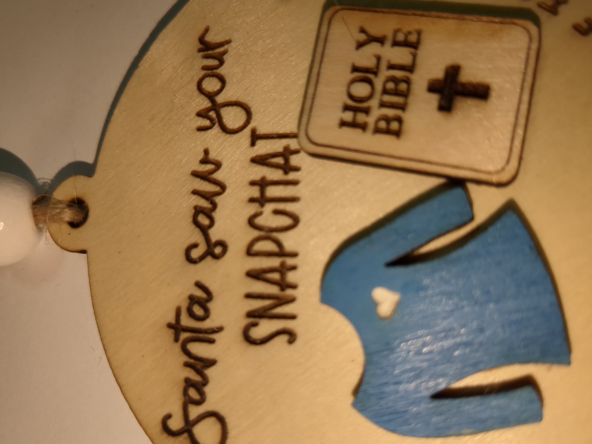 Ornament or car charm. Santa saw your Snapchat