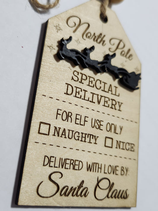 Wooden ornament or car charm.  North Pole special delivery.  Elf use.